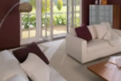 Salón moderno con puertas balconeras de PVC Intelivent que ofrecen máximo confort y vistas.